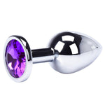tapón anal con un diamante morado